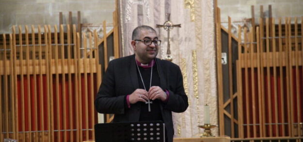 Arun Aurora Picture of Bishop Arun Aurora delivering his lecture.