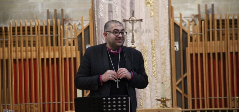 Picture of Bishop Arun Aurora delivering his lecture.